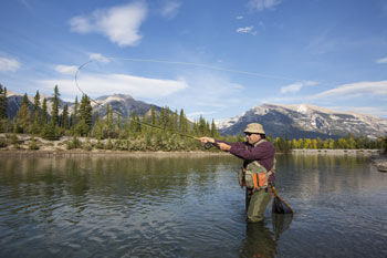 man fly fishing