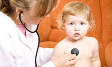Nurse checking baby heartbeat